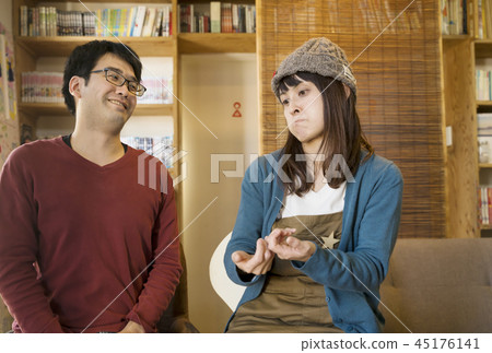 Couple talking in sign language Couple talking in sign language 45176141