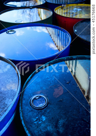 Reflection in water on old barrels Reflection in water on old barrels 45176668
