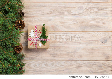 Christmas gift box wrapped in recycled paper 45178357