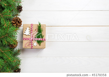 Christmas gift box wrapped in recycled paper 45178358