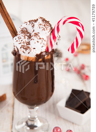 Christmas cup with hot chocolate and whipped cream. 45179789