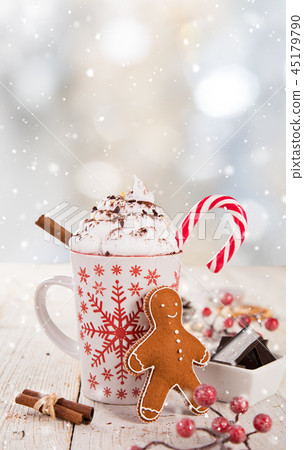 Christmas cup with hot chocolate and whipped cream. Christmas cup with hot chocolate and whipped cream. 45179790