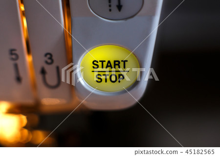Close-up of a sewing machine button. workplace tailor. sewing industry 45182565