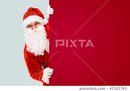 Santa Claus with colorful advertisement board 45183763