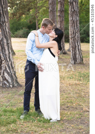 Handsome man and beautiful pregnant wife Handsome man and beautiful pregnant wife 45183846