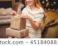 Blonde near the Christmas tree 45184088