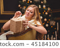 Blonde near the Christmas tree 45184100