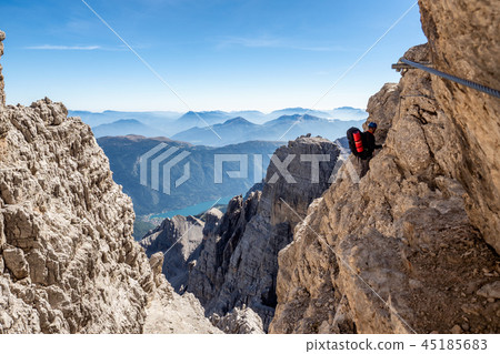 Male mountain climber on a Via Ferrata 45185683
