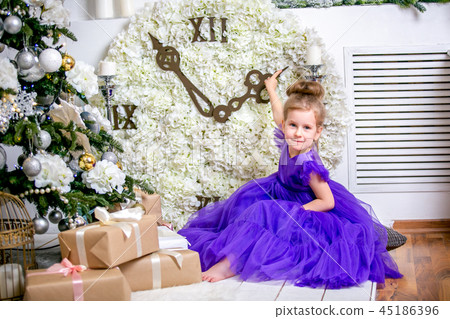 Pretty little girl 4 years old in a blue dress Pretty little girl 4 years old in a blue dress 45186396