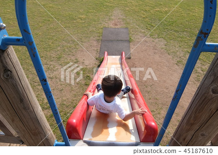 Children playing on the slide 45187610