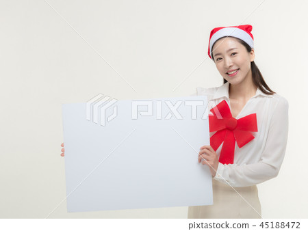 Christmas Day. Korea woman holding a white card 45188472