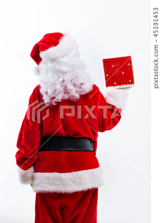Santa holding a Christmas gift Santa holding a Christmas gift 45191453