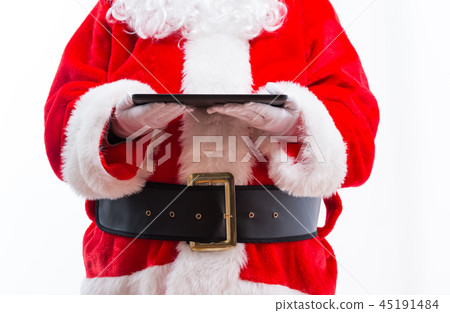 Santa holding a tablet computer 45191484