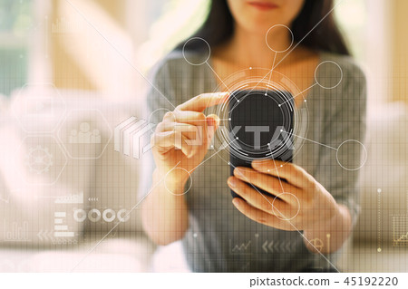 Tech circle with woman using a smartphone Tech circle with woman using a smartphone 45192220