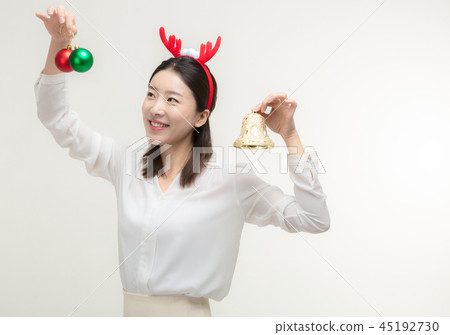 Christmas Day. Korea woman holding xmas props 45192730