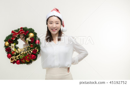 Christmas Day. Korea woman holding xmas props 45192752