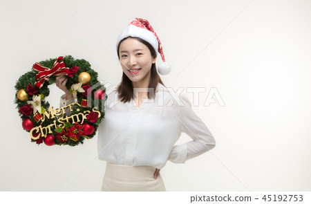 Christmas Day. Korea woman holding xmas props 45192753