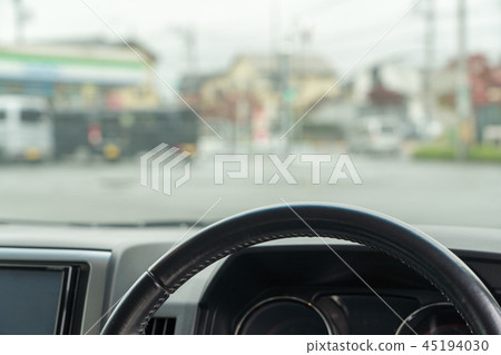 Rainy day Convenience store parking lot 45194030