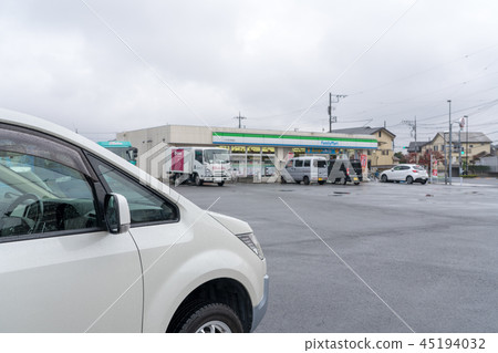 Rainy day Convenience store parking lot 45194032