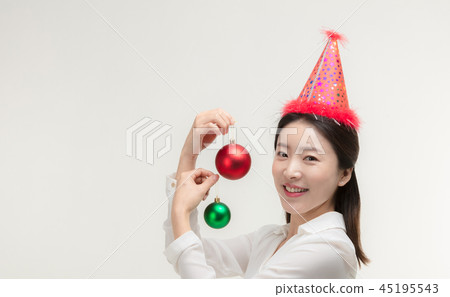 Christmas Day. Korea woman holding xmas props 45195543