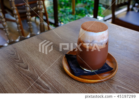 Cool chocolate or cocoa with milk froth on top Cool chocolate or cocoa with milk froth on top 45197299