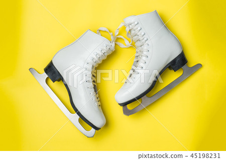 Concept winter holidays. White figure skates Concept winter holidays. White figure skates 45198231
