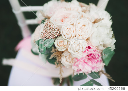 Beautiful wedding bouquet with different flowers, roses 45200266