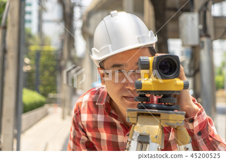 Engineer man survey with tacheometer or theodolite 45200525