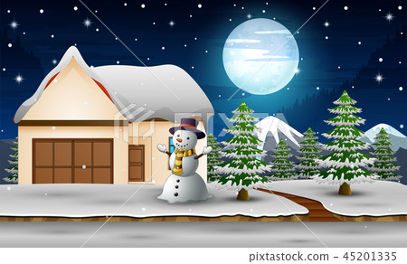 Cute snowman standing next to home in the night 45201335