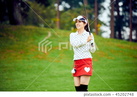 Women playing golf Women playing golf 45202748