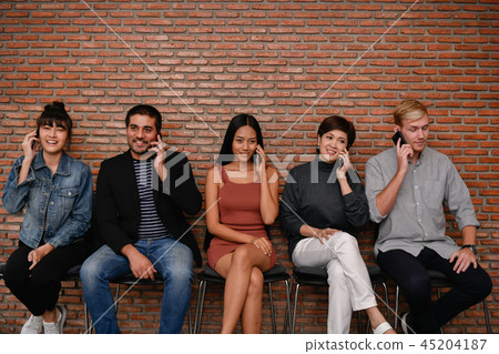 Business concept. Businessmen are using cell phones. Business pe Business concept. Businessmen are using cell phones. Business pe 45204187