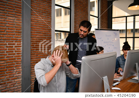 Business concept. Businessmen are under pressure from work. Youn 45204190