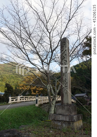 It is a monument of the Taga Taisha Goshojo in Shiga Prefecture and the scenery of a Satoyama It is a monument of the Taga Taisha Goshojo in Shiga Prefecture and the scenery of a Satoyama 45206135