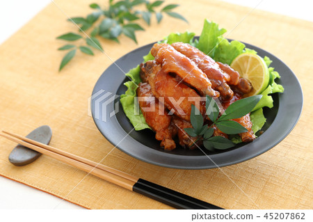 Chicken wings with teriyaki sauce 45207862