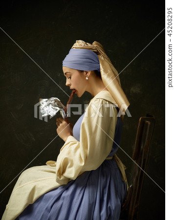 Medieval Woman in Historical Costume Wearing Corset Dress and Bonnet. 45208295