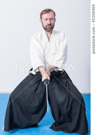 A man with katana on Iaido practice 45208409