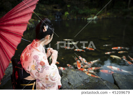 A woman in Japanese clothes A woman in Japanese clothes 45209679