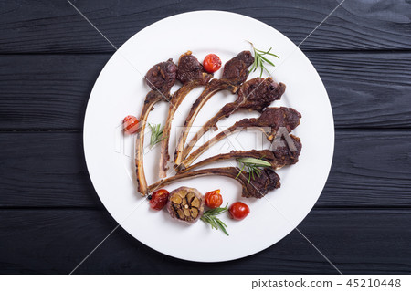 Grilled ribs or rack of lamb and ingridient Grilled ribs or rack of lamb and ingridient 45210448