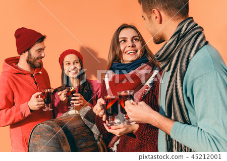 Smiling european men and women during party photoshoot. Smiling european men and women during party photoshoot. 45212001