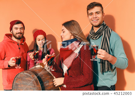 Smiling european men and women during party photoshoot. Smiling european men and women during party photoshoot. 45212003