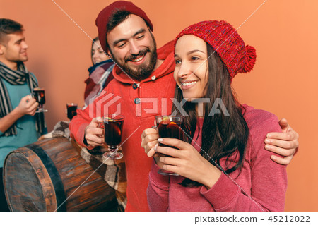 Smiling european men and women during party photoshoot. 45212022