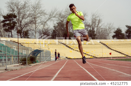 Man running on ground 45212775