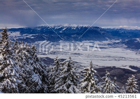 winter landscape in Postavaru Mountains, Romania 45213561