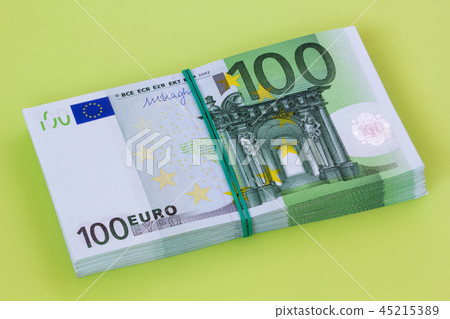 pile of one hundred euro banknotes pile of one hundred euro banknotes 45215389