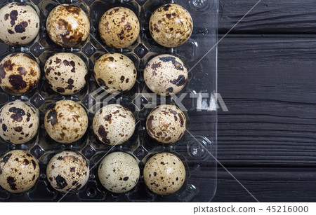 Raw qail eggs background 45216000
