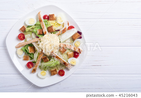 Salad ceasar with chicken , eggs and tomatoes Salad ceasar with chicken , eggs and tomatoes 45216043