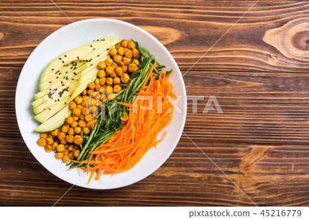 Buddha bowl with avocado cucumber carrot chickpea Buddha bowl with avocado cucumber carrot chickpea 45216779
