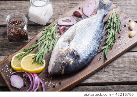 Raw dorado fish and ingridient for cooking Raw dorado fish and ingridient for cooking 45216796