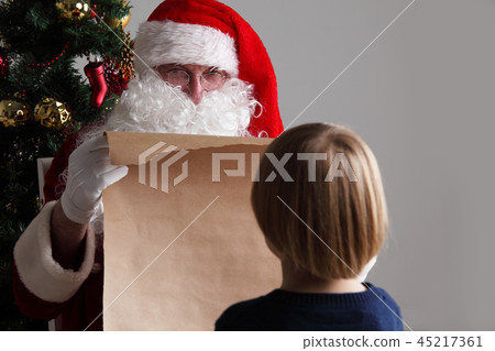 Santa Claus and child Santa Claus and child 45217361