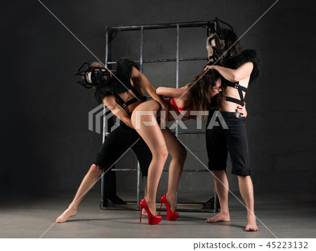 Men and woman acting erotic bdsm perfomance 45223132